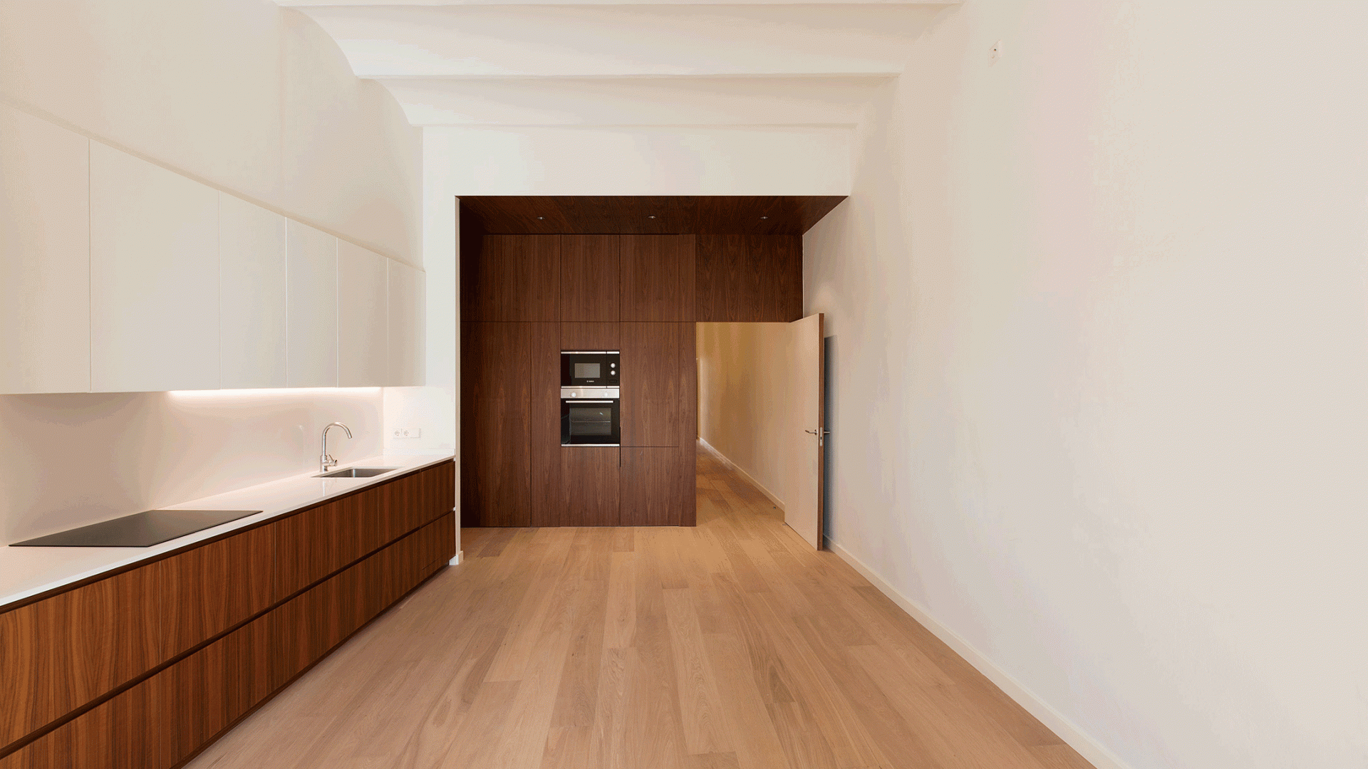 moving image of rebuild kitchen with wooden elements and a door that is opening and closing